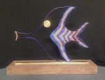 Striped Tail Bottlenose Fish, 5 x 17 x 22, dyed stainless steel and brass on walnut base (9/2015)